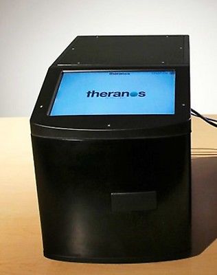 Black plastic box that says Theranos - Edison machine that never worked